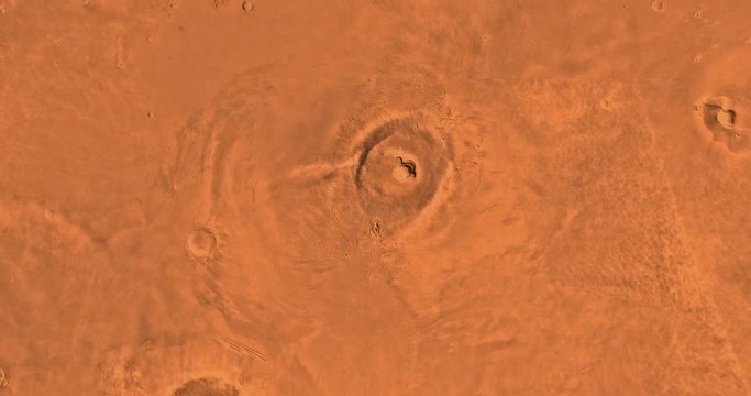 Very high altitude aerial flyover of Mars' eastern Tharsis region. No HUD. Clip is reversible and can be rotated 180 degrees. Data: NASA/JPL/USGS