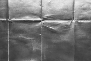 Silver gift paper folded, background