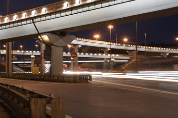 Fototapeta na wymiar elevated road junction and interchange overpass at night
