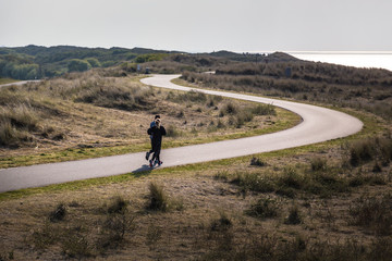 Obraz premium young couple jogging at the beach at dawn