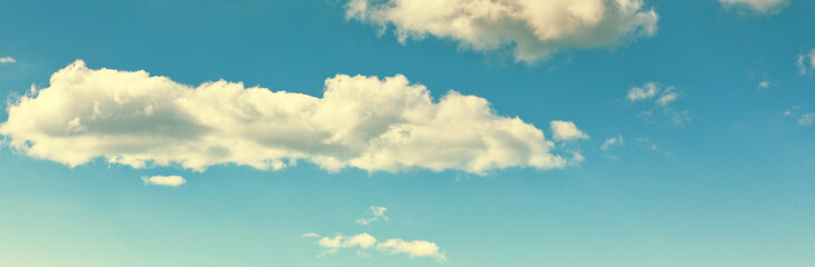 Long wide banner with blue sky