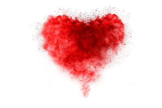 Explosion of colored powder isolated on white background.