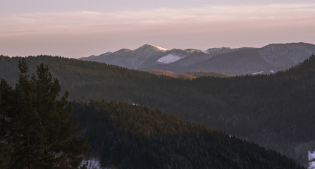 Mountain ridge in winter in the snow