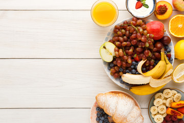 Fresh healthy breakfast with fruits copy space