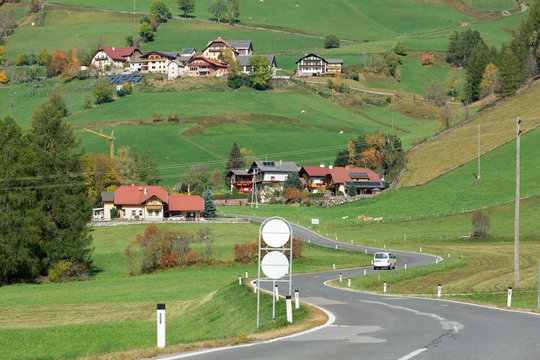Winding road through the village of Rennweg am Katschberg, located  in the Katsch Valley (Katschtal) in the Alps mountains. Carinthia, Austria.