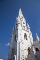 Fototapeta na wymiar Tower of San Thome Basilica or St. Thomas Cathedral Basilica, a famous tourist attraction in Chennai, Tamil Nadu, India