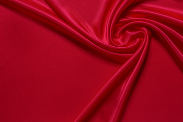 Red cloth waves background texture.