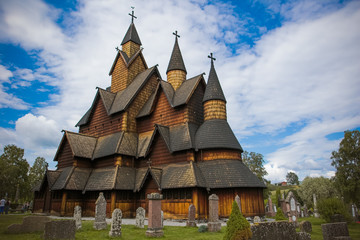 Fototapeta na wymiar Ancient wooden church of 1200 d.c. located in the south of Norway
