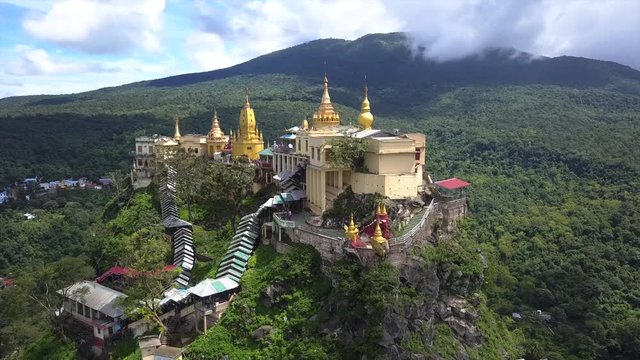 Aerial view from the drone on the Mount Popa,home of Nat the Burmese mythology ghost this place is the old volcano in Bagan, Myanmar