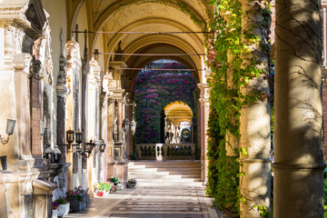 Early morning sun rays shining on arcades of the famous Mirogoj cemetery in Zagreb, Croatia