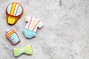 Cook gingerbread cookies for baby shower on stone background top view mockup