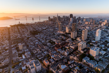 Dramatic aerial view of San Francisco at sunrise from Russian Hill looking towards the financial...