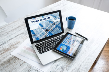Stock market trading app on a Tablet PC and Laptop PC