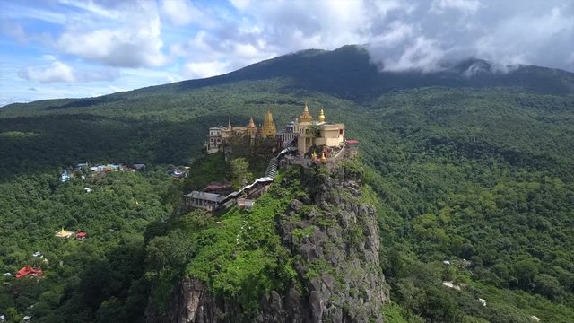 Aerial view from the drone on the Mount Popa,home of Nat the Burmese mythology ghost this place is the old volcano in Bagan, Myanmar
