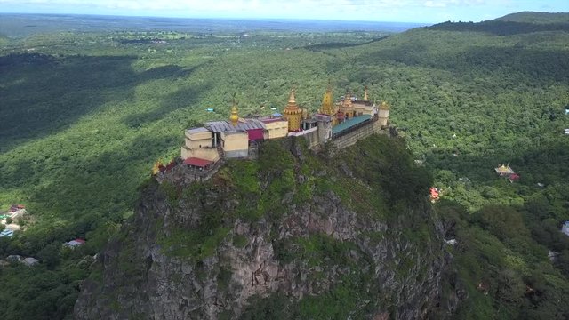 Aerial view from the drone on the Mount Popa,home of Nat the Burmese mythology ghost this place is the old volcano in Bagan, Myanmar