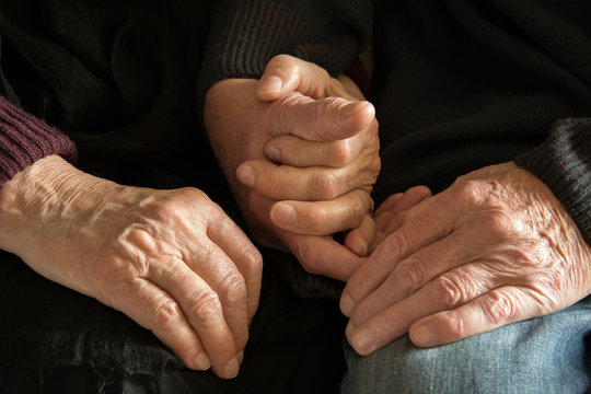 Old couple's hands - holding