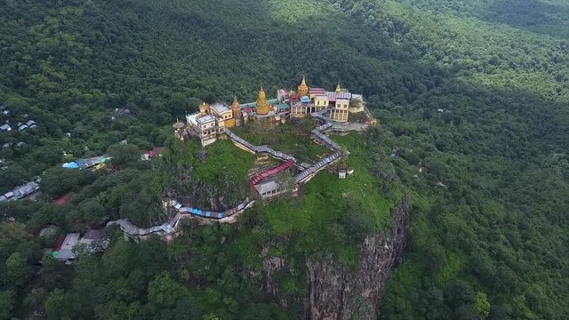 Aerial view from the drone on the Mount Popa,home of Nat the Burmese mythology ghost this place is the old volcano in Bagan, Myanmar