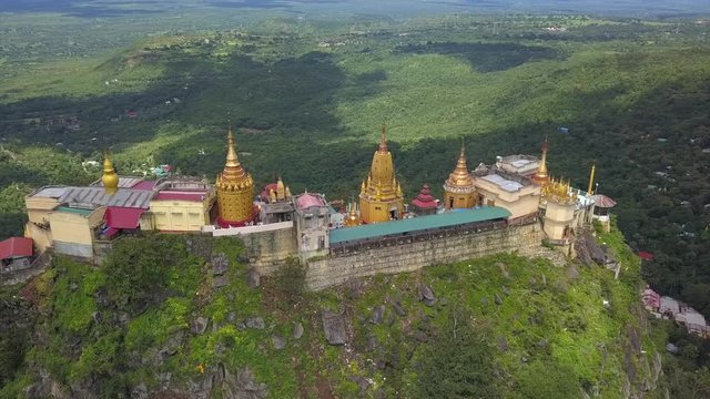 Aerial view from the drone on the Mount Popa,home of Nat the Burmese mythology ghost this place is the old volcano in Bagan, Myanmar