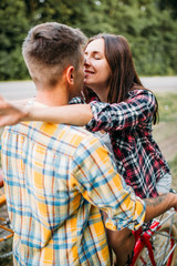 Man and woman kissing, romantic date, retro bikes