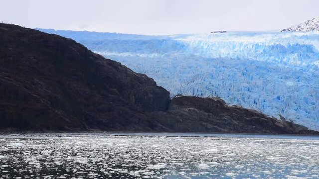 Glacier bay national park in Alaska with iceberg and glacier wall