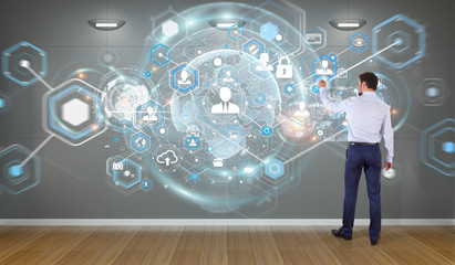 Businessman using social network interface on a wall 3D rendering