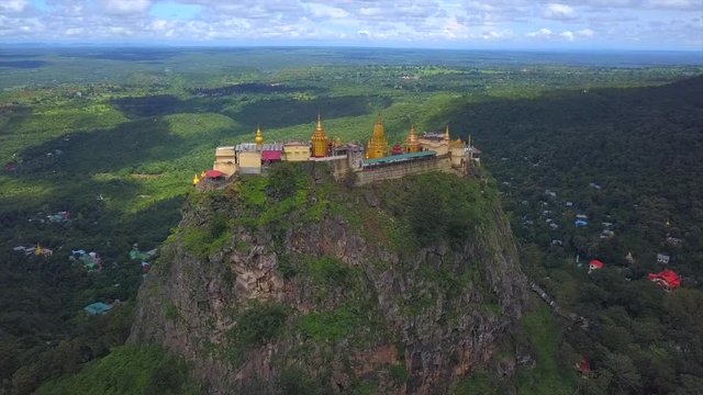 Aerial view from the drone on the Mount Popa,home of Nat the Burmese mythology ghost this place is the old volcano in Bagan, Myanmar