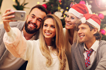 Group of friends having fun during Christmas