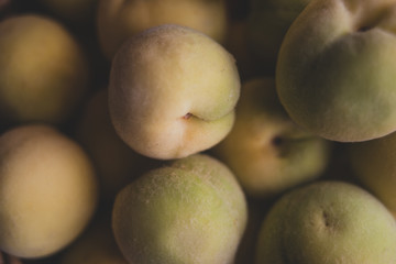 Pile of vineyard peach close up