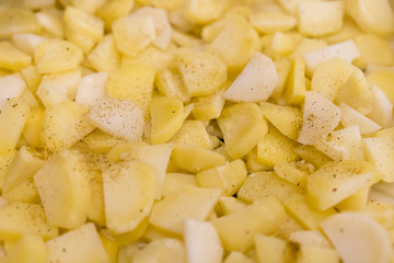 Raw vegetables before baking with spice