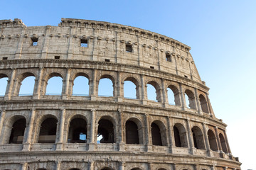 Fototapeta na wymiar Ancient Colosseum at sunrise, Rome, Italy