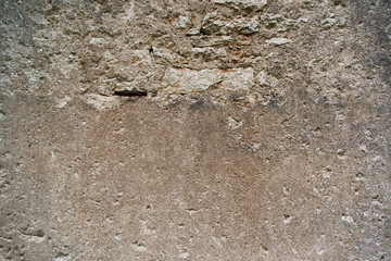 The texture of weathered concrete wall