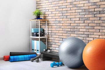 Different physiotherapy equipment in room