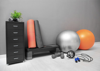 Different physiotherapy equipment in room