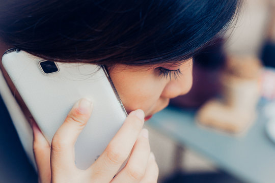 Asian Business Woman Using Smartphone To Contract Business. Copy Space. Now A Day Mobile Phones An Important Role In The Business. Today, Many Women Do Business And Are Not Inferior To Men.