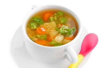 Ceramic bowl with soup for baby on white background