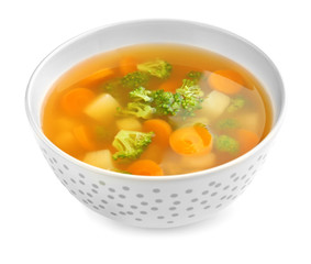 Ceramic bowl with soup for baby on white background