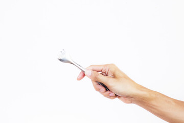 A man hand holding kitchen tongs on white background. Hand holding metal serving kitchen tongs like a picking food or barbecue. Tongs for pick food, ice, barbecue, vegetable Instead of using the hand.