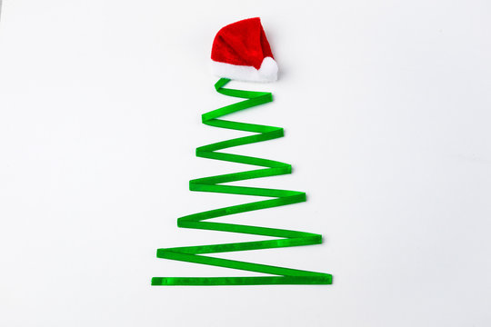 Christmas tree made from ribbon on white background. Christmas background. Copy space.Top view