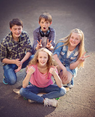 Portrait of happy fashion teens having fun 