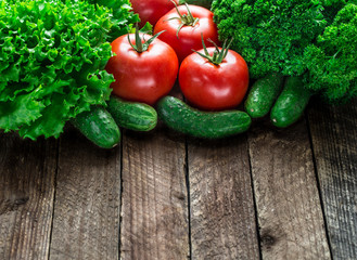 Fresh vegetables on wooden background