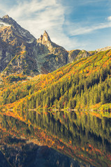 Obraz premium Tatra mountains, Morskie Oko lake and Mnich peak, fall morning, Poland