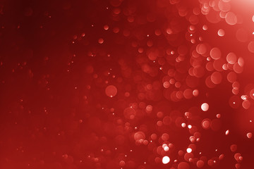 Glitter light abstract red bokeh christmas blurred background