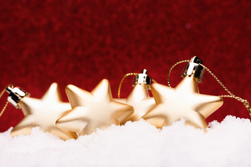 Christmas composition of Christmas tree toys on a red background