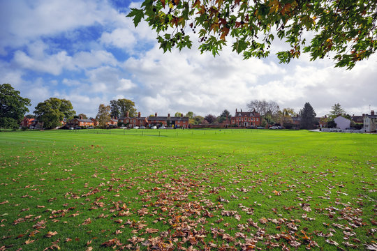 Autumn leaves at Hartley Wintney village cricket ground in Hampshire, UK