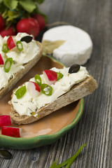 Fototapeta na wymiar cream cheese for bread, high quality healthy breakfast on the old rustic table