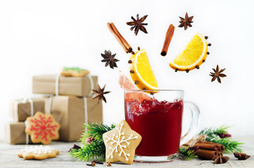 Mulled wine with flying ingredients to prepare it