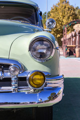old car on the road in autumn