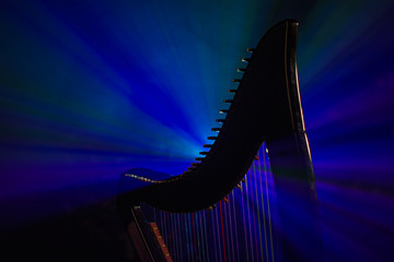 Electro harp in the rays of light