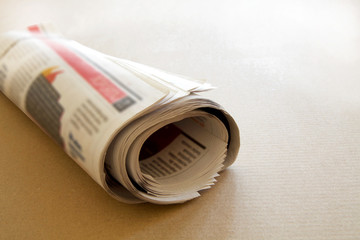 Newspaper on brown background