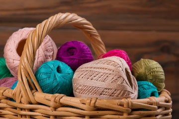 Fototapeta na wymiar Skeins of yarn in basket